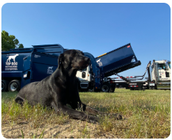 Top Dog Waste Solutions trucks and worker