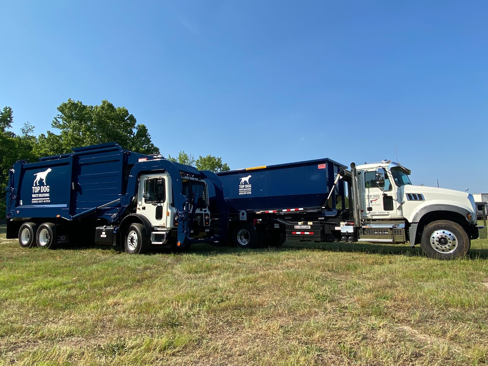 Top Dog Waste Solutions trucks are prepared for scheduled trash pickup service