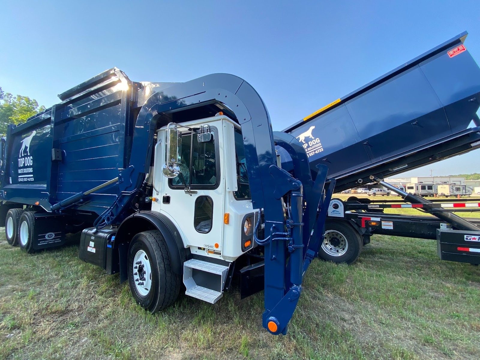 A Top Dog Waste Solutions truck parked and ready to collect recyclables from a commercial facility