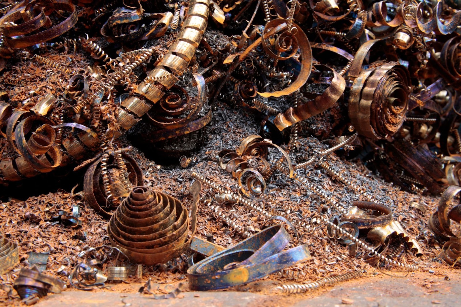 A collection of ferrous and non-ferrous scrap metal.